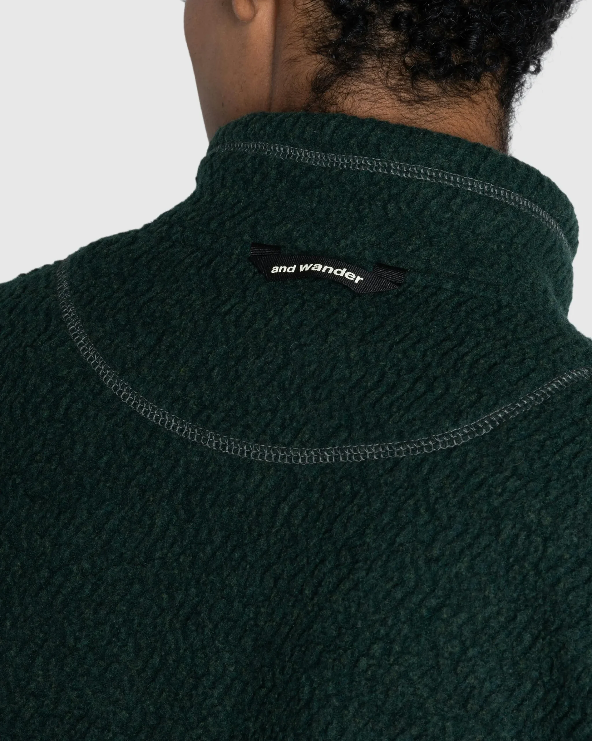 And Wander Re Wool JQ Stand Zip- Outerwear